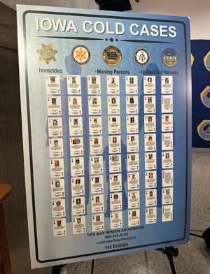 Display showing all 52 card designs, each featuring a different Iowa cold case